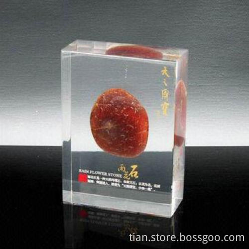 Acrylic desk paperweight with stone embedment for souvenir